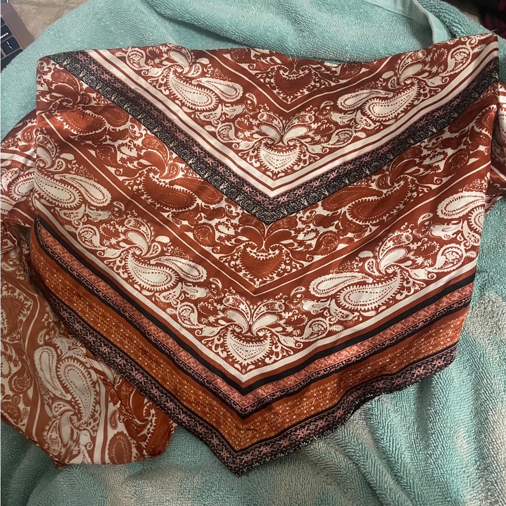 Stretchy and 100% polyester/Rue 21 tube top/ bandana style/ L women’s